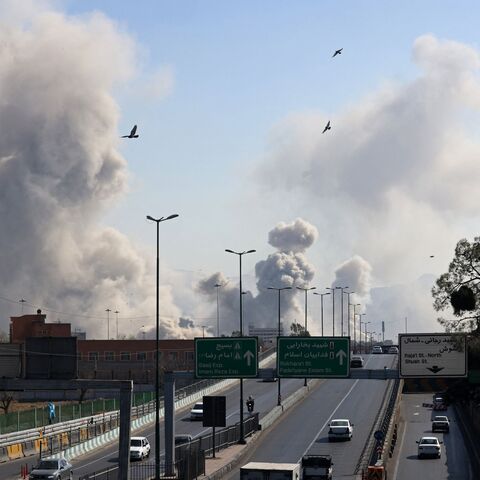 smoke rising after a strike on the Iranian capital of Tehran
