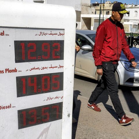 Fuel prices are displayed at a petrol station in Rabat