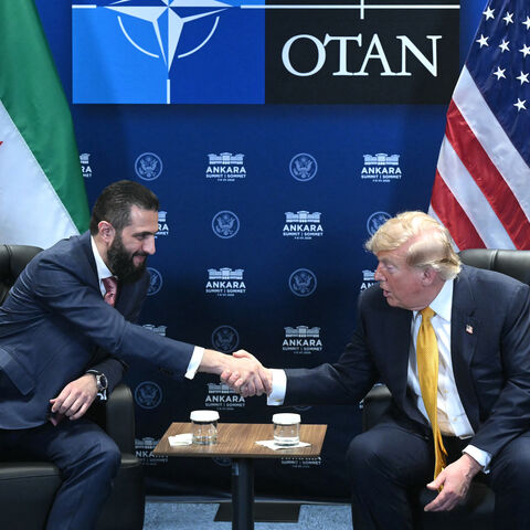 US President Donald Trump meets Syrian President Ahmed al-Sharaa (L) on the sidelines of the NATO Summit at Bestepe Presidential Compound in Ankara, on July 8, 2026. 