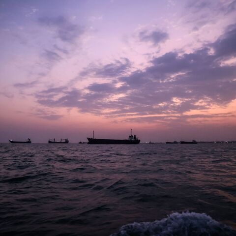 Vessels transit the Strait of Hormuz off the coast of the port city of Bandar Abbas in southern Iran