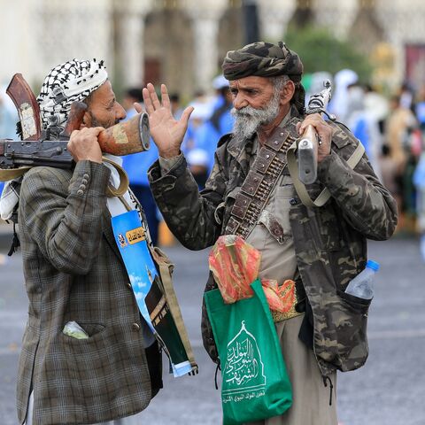 Supporters of the Houthi authorities hold their weapons during a protest against the Saudi intervention in Yemen and against Saudi Arabia's recent accusation that the Houthis fired at the holy city of Mecca, in Sanaa, on Sept. 18, 2026. 