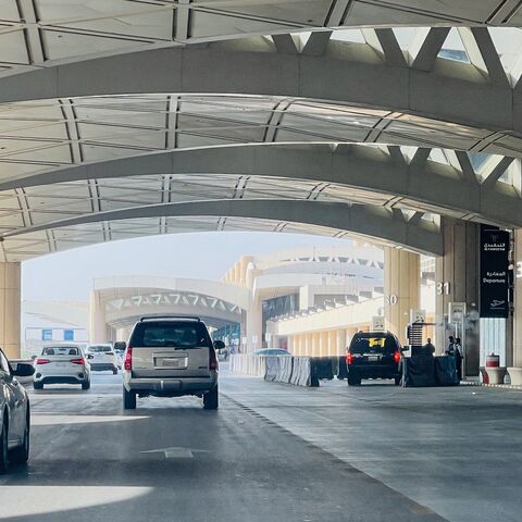 Cars drive past the gates of King Khalid International Airport in Riyadh on Sept. 19, 2026. 