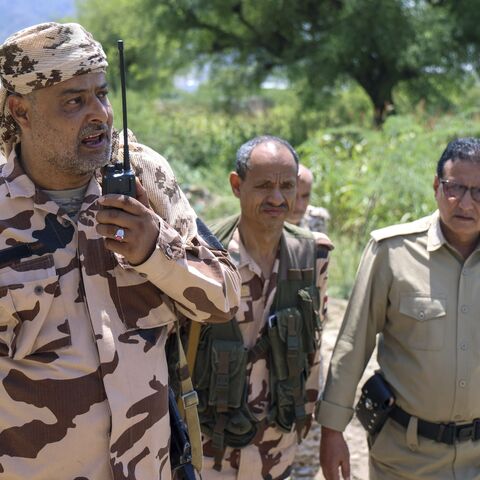 Saudi-backed Yemen government soldiers gather near the Jabal Han front, west of the city of Taiz, following fierce battles earlier in the day as Yemen's Houthis reportedly attempted to seize control of the main route between the inland city of Taiz and the coastal city of Aden, on Oct. 3, 2026.