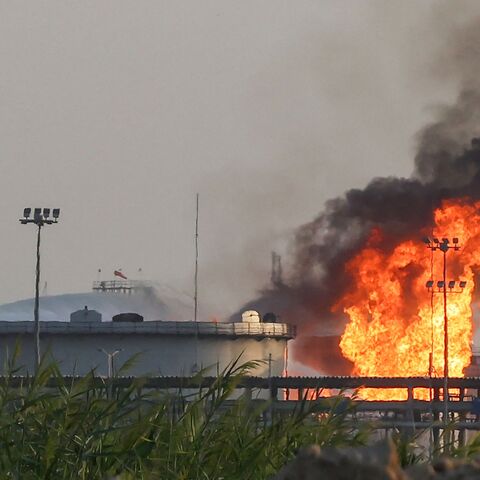Flames burn at a facility belonging to Saudi oil giant Aramco south of Riyadh