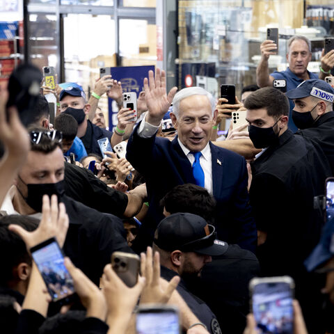 Israeli Prime Minister and Likud Party leader, Benjamin Netanyahu greets supporters during a campaign event at a mall ahead of Israel's general elections scheduled for next week on October 18, 2026 in Yoqne'am Israel. Israel will hold legislative elections on October 27, 2026. (Photo by Amir Levy/Getty Images)