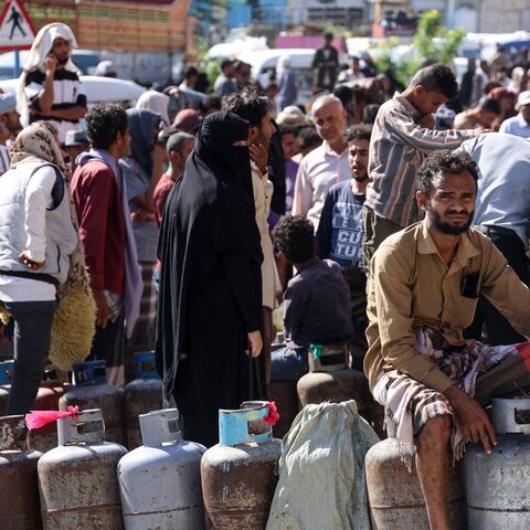 Yemenis line up to refill gas bottles at a refilling station in Taiz, on Oct. 19, 2026.