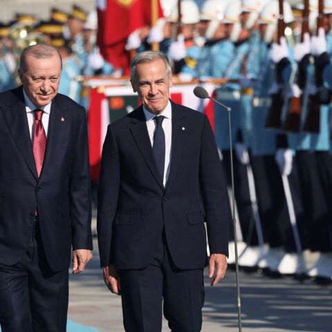 Turkish President Recep Tayyip Erdogan welcomes Canadian Prime Minister Mark Carney