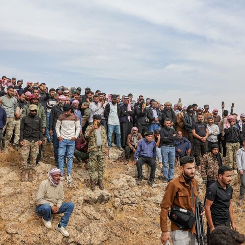 Mourners attend the funeral of those who were killed in airstrikes carried out by Jordan the night before on the village of Al-Taf in the Al-Lajat region, located in the northeastern countryside of Daraa, on Oct. 27, 2026. 