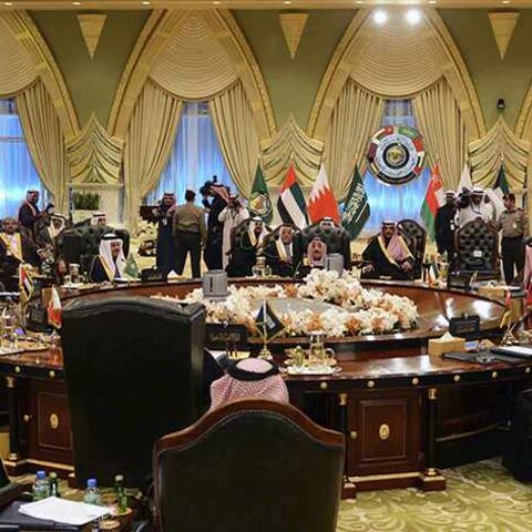 Heads of States of the Gulf Cooperation Council sit at a round table in Bayan Palace for the opening session of the 34th GCC Summit hosted by Kuwait December 10, 2013. REUTERS/Stringer (KUWAIT - Tags: POLITICS) - RTX16CHR