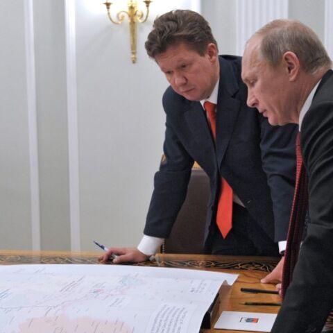 Russia's President Vladimir Putin (R) meets with Gazprom's Chief Executive Alexei Miller at the Novo-Ogaryovo residence outside Moscow, October 29, 2012. Russia's Gazprom pledged more than $38 billion (23.7 billion pounds) to develop an East Siberian gas field and build a pipeline to the Pacific port of Vladivostok to lessen its reliance on exports to Europe and develop Asian markets. REUTERS/Aleksey Nikolskyi/RIA Novosti/Pool (RUSSIA - Tags: POLITICS ENERGY BUSINESS) THIS IMAGE HAS BEEN SUPPLIED BY A THIRD