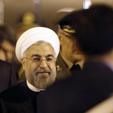 Iran's President Hassan Rouhani arrives at Pudong International Airport, ahead of the fourth Conference on Interaction and Confidence Building Measures in Asia (CICA) summit in Shanghai May 20, 2014.  REUTERS/Carlos Barria (CHINA - Tags: POLITICS) - RTR3Q000
