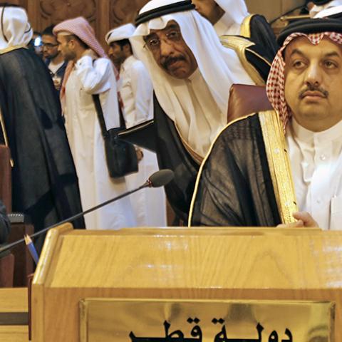 Qatar's Foreign Minister Khalid bin Mohammed Al Attiyah (front) attends an extraordinary session of the Arab League at the league's headquarters in Cairo July 14, 2014. Egypt launched an initiative on Monday to halt fighting between Israel and Palestinian militants, proposing a ceasefire to be followed by talks in Cairo on settling the conflict in which Gaza authorities say more than 170 people have died. REUTERS/Amr Abdallah Dalsh  (EGYPT - Tags: POLITICS CIVIL UNREST) - RTR3YNM0
