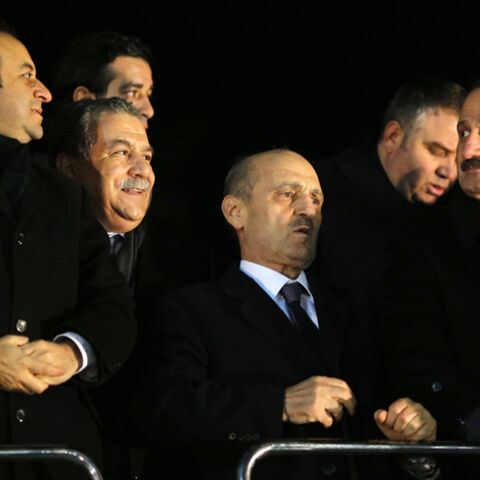 (L-R) Turkey's European Affairs Minister Egemen Bagis, Interior Minister Muammer Guler, Environment and City Planning Minister Erdogan Bayraktar and Economy Minister Zafer Caglayan wait for the arrival of the prime minister at Esenboga Airport in Ankara December 24, 2013. Turkish ministers Caglayan and Guler resigned on Wednesday after their sons were arrested in a corruption investigation that has pitted the government against the judiciary and rattled foreign investors. Guler and Caglayan each had a son a