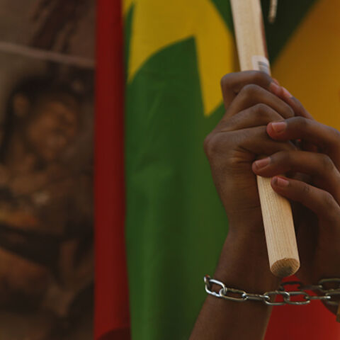 Ethiopian migrants, all members of the Oromo community of Ethiopia living in Malta, protest against the Ethiopian regime in Valletta, Malta, December 21, 2015. Protesters are calling on Malta and the European Union to stop support for the Ethiopian regime, and protested against the regime's plan to evict Oromo farmers to expand Ethiopia's capital Addis Ababa, according to the protest organisers. REUTERS/Darrin Zammit Lupi  MALTA OUT. NO COMMERCIAL OR EDITORIAL SALES IN MALTA - RTX1ZMDR