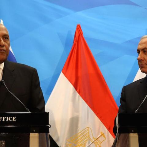 Israeli Prime Minister Benjamin Netanyahu (R) gives a joint statement with Egyptian Foreign Minister Sameh Shoukry prior to their meeting at his Jerusalem office on July 10, 2016.
Shoukry met Netanyahu in Jerusalem for talks on reviving peace efforts with the Palestinians, in the first such visit in nearly a decade and the latest sign of warming ties.

 / AFP / GALI TIBBON        (Photo credit should read GALI TIBBON/AFP/Getty Images)