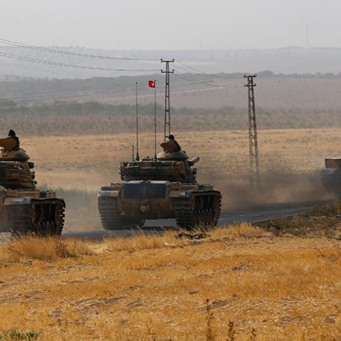 Turkish army tanks drive towards to the border in Karkamis on the Turkish-Syrian border in the southeastern Gaziantep province, Turkey, August 25, 2016. REUTERS/Umit Bektas - RTX2MYJC
