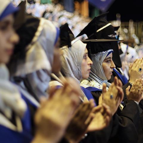 Palestinian students attend their graduation ceremony at the University College of Applied Sciences in Gaza City September 10, 2014. REUTERS/Ibraheem Abu Mustafa (GAZA - Tags: EDUCATION) - RTR45QL9