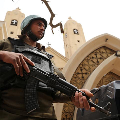 An armed policeman secures the Coptic church that was bombed on Sunday in Tanta, Egypt April 10, 2017. REUTERS/Mohamed Abd El Ghany - RTX34WSO