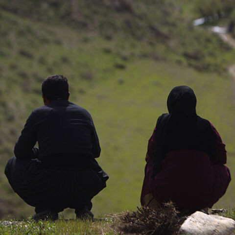 An Iranian Sunni Kurd couple is seen near Marivan in Kurdistan province, 512 km (320 miles) west of Tehran May 13, 2011. Iranian Shi'ite and Sunni Kurds live in harmony with each other in Marivan, although Sunni is the religion of the majority of the people. REUTERS/Morteza Nikoubazl (IRAN - Tags: SOCIETY RELIGION) - RTR2ME01