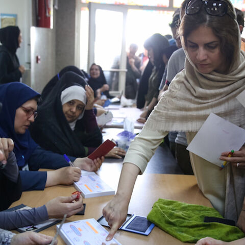 Voters cast their ballots during the presidential election in a Jewish and Christian district in the center of Tehran, Iran, May 19, 2017. TIMA via REUTERS ATTENTION EDITORS - THIS IMAGE WAS PROVIDED BY A THIRD PARTY. FOR EDITORIAL USE ONLY. - RTX36KLY