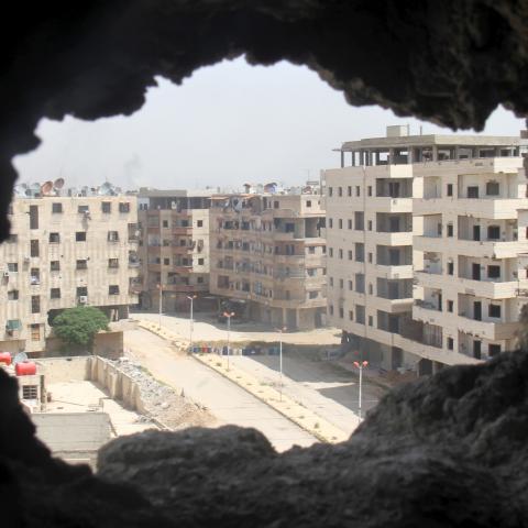 A general view shows a deserted street at the beginning of the Yarmouk Palestinian refugee camp April 29, 2015. A bout of fighting between militants over control of the Yarmouk refugee camp on the edge of Damascus has only compounded the misery of residents already suffering from acute shortages of food, clean water and power. REUTERS/Ward Al-Keswani - GF10000077547