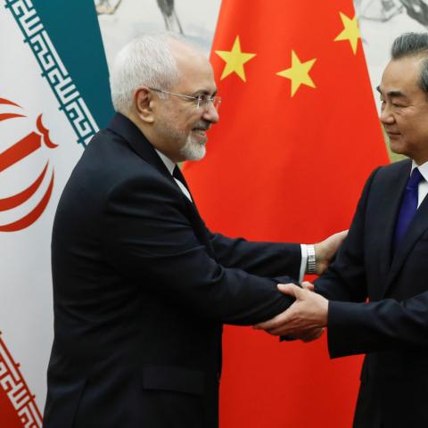 Chinese State Councillor and Foreign Minister Wang Yi meets Iranian Foreign Minister Mohammad Javad Zarif at Diaoyutai state guesthouse in Beijing, China May 13, 2018. REUTERS/Thomas Peter - RC1EE6C163D0