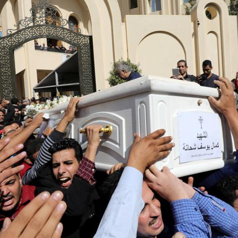 Mourners carry a coffin during the funeral of Coptic Christians who were killed in an attack, in Minya, Egypt November 3, 2018. REUTERS/Mohamed Abd El Ghany - RC193E912290