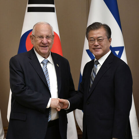 South Korean President Moon Jae-in (R) shakes hands with Israeli President Reuven Rivlin (L) during their meeting at the presidential Blue House in Seoul, South Korea July 15, 2019. Jung Yeon-je/Pool via REUTERS - RC11CC393B00