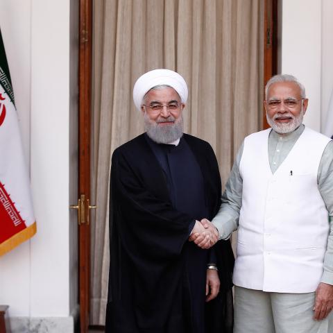Iranian President Hassan Rouhani shakes hands with India's Prime Minister Narendra Modi (R) during a photo opportunity ahead of their meeting at Hyderabad House in New Delhi, India, February 17, 2018. REUTERS/Adnan Abidi - RC1353D19310