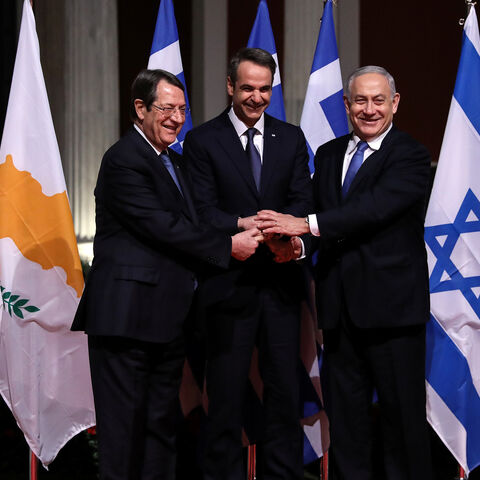 (From L to R) Cypriot President Nicos Anastasiades, Greek Prime Minister Kyriakos Mitsotakis and Israeli Prime Minister Benjamin Netanyahu pose for a photo before signing a deal to build the EastMed subsea pipeline to carry natural gas from the eastern Mediterranean to Europe, at the Zappeion Hall in Athens, Greece, January 2, 2020. REUTERS/Alkis Konstantinidis - RC2U7E9A69GD