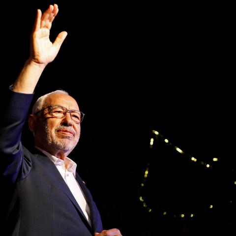 Rached Ghannouchi, leader of Tunisia's moderate Islamist Ennahda party, greets his supporters during a campaign event ahead of the parliamentary elections in Tunis, Tunisia October 3, 2019. Picture taken October 3, 2019. REUTERS/Zoubeir Souissi - RC1EF9226400