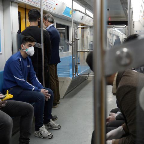 People wear protective face masks, following the outbreak of coronavirus, as they sit in a metro in Tehran, Iran March 17, 2020. WANA (West Asia News Agency)/Ali Khara via REUTERS ATTENTION EDITORS - THIS PICTURE WAS PROVIDED BY A THIRD PARTY - RC2PLF9NILL2