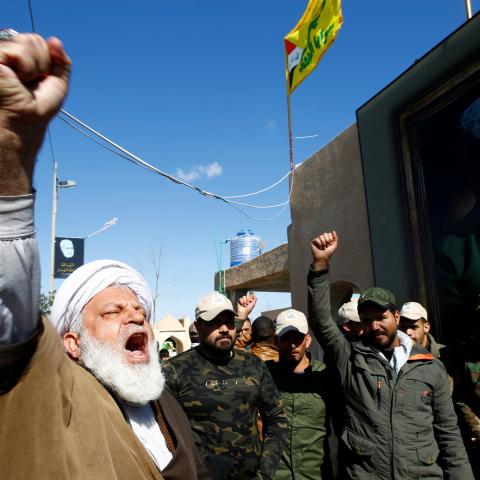 An Iranian cleric chants slogans as they gather to mourn during the forty days memorial, after the killing of Iran's Quds Force top commander Qassem Soleimani and the Iraqi militia commander Abu Mahdi al-Muhandis in a U.S. air strike at Baghdad airport, at the "Valley of Peace" cemetery in Najaf, Iraq February 11, 2020. REUTERS/Alaa al-Marjani - RC2BYE9HRC06
