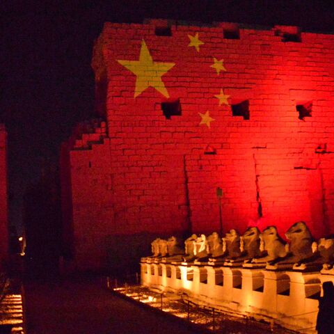 The Karnak Temple in Upper Egypt's ancient city of Luxor is pictured on March 1, 2020 with the Chinese flag in solidarity with the Chinese people amidst a world outbreak of coronavirus COVID-19, which originated in China. (Photo by - / AFP) (Photo by -/AFP via Getty Images)