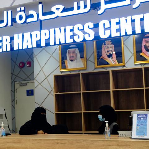 Saudi female employees work at the customers service desk at a hypermarket, newly launched by the operator LuLu and run by a team of women, in the Saudi Arabian port city of Jeddah, on February 21, 2021. (Photo by Amer HILABI / AFP) (Photo by AMER HILABI/AFP via Getty Images)