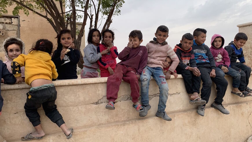 Children play in Tel Nasr on Nov. 4 (Amberin Zaman/Al-Monitor)
