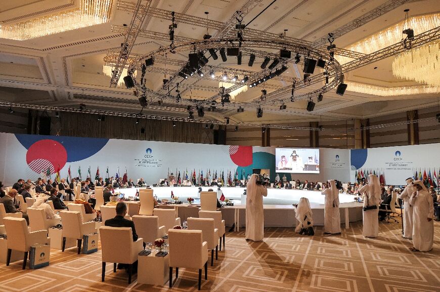 Delegates from member countries attend the final session of the Gas Exporting Countries Forum (GECF) summit in Qatar's capital Doha