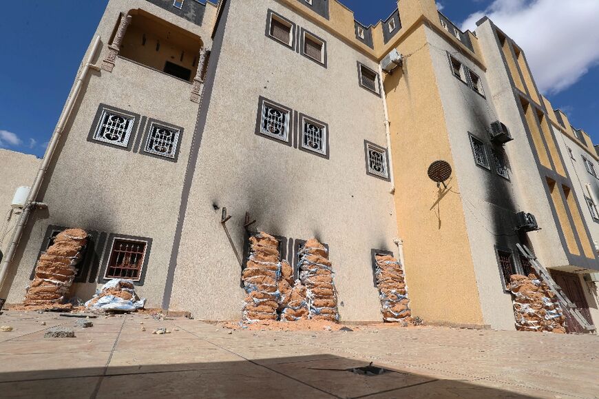 A picture from March 26, 2021 shows the damaged and abandoned villa complex used by the Libyan family who commanded the militia that traumatised the town of Tarhuna