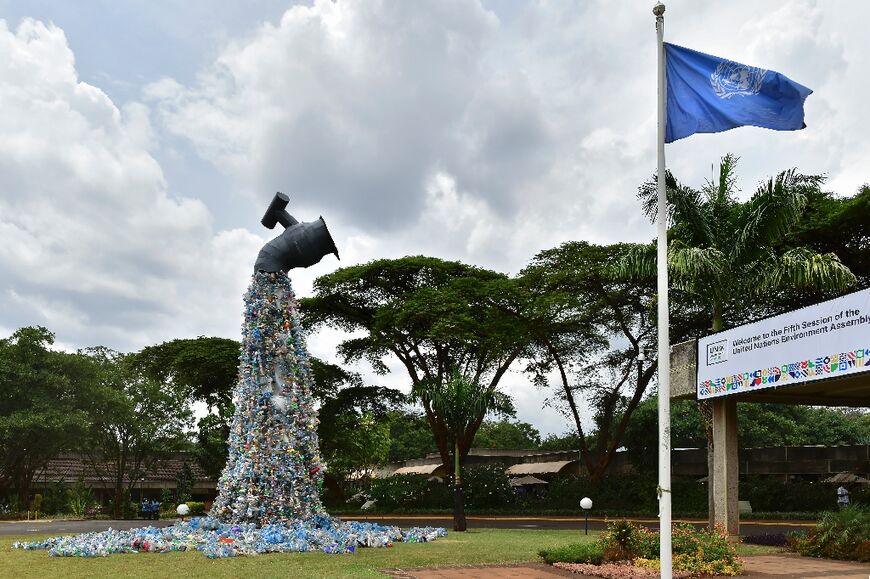 A monument themed 'turn off the plastics tap' by Canadian activist and artist, Benjamin von Wong, using waste retrieved from Nairobi's largest slum, Kibera, stands outside the United Nations Environment Programme Headquarters in Nairobi