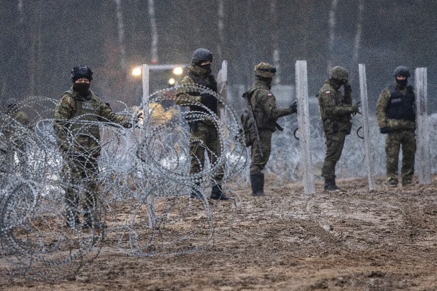 Border guards and soldiers during the construction of fortifications along the Polish-Belarus border in Tolcze, Sokolka County in north-eastern Poland, on January 27, 2022