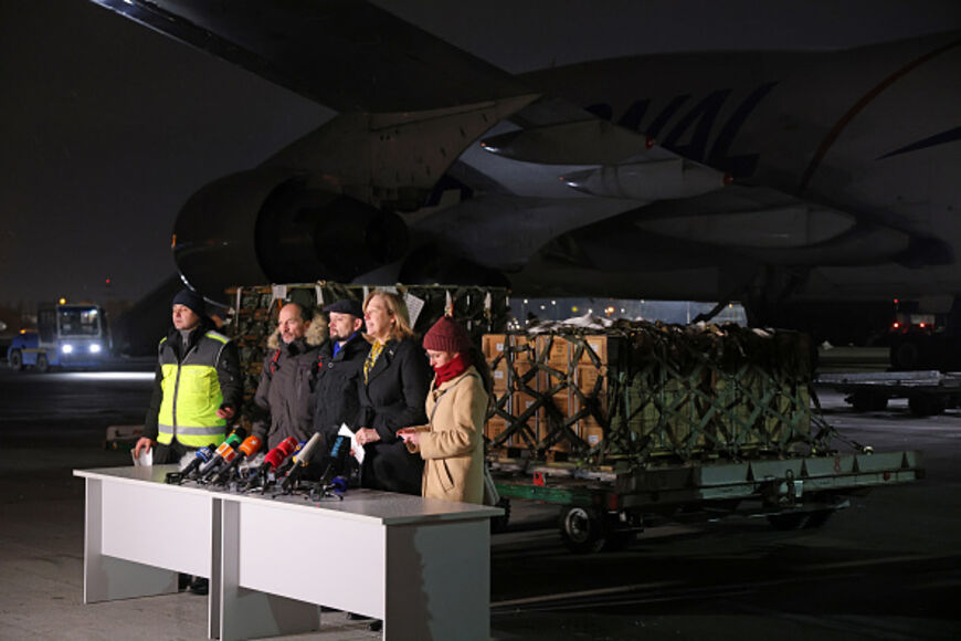 US Embassy Charge d'Affaires Kristina Kvien and Ukrainian Deputy Defense Minister Rostyslav Zamlynskii speak to the media following the unloading of Javelin anti-tank missiles and other military hardware delivered to Boryspil Airport near Kyiv on January 25, 2022. – Sean Gallup/Getty Images