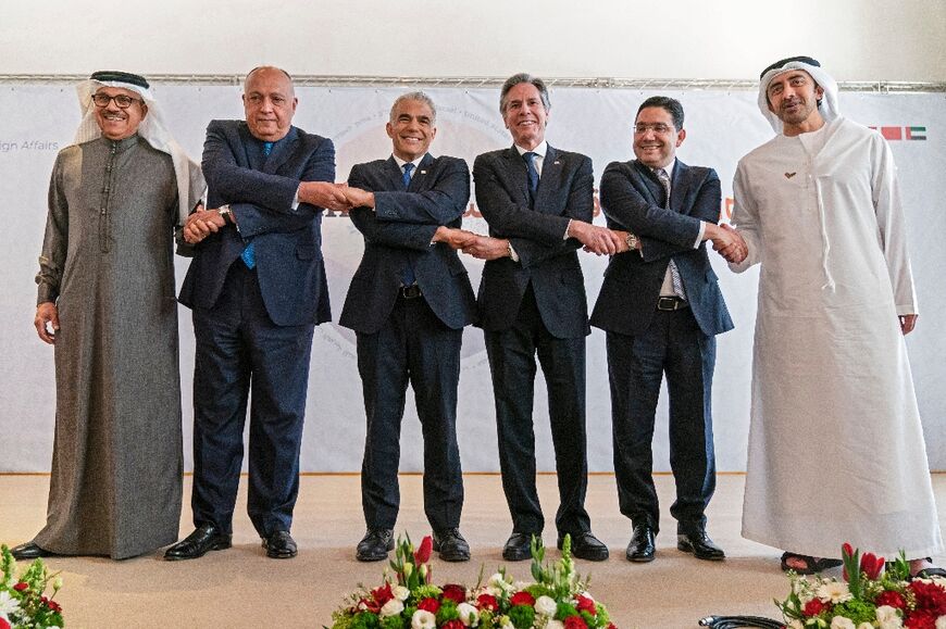 From the left, the foreign minister of Bahrain, Abdullatif bin Rashid al-Zayani, Egypt's Sameh Shoukry, Israel's Yair Lapid, United States' Antony Blinken, Morocco's Nasser Bourita and UAE's Sheikh Abdullah bin Zayed al-Nahyan