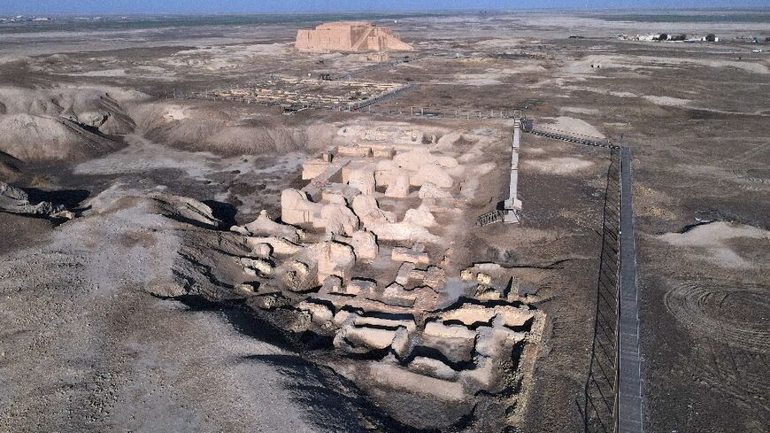 The Great Ziggurat temple (back) in the ancient city of Ur in Iraq's southern province of Dhi Qar near the city of Nasiriyah