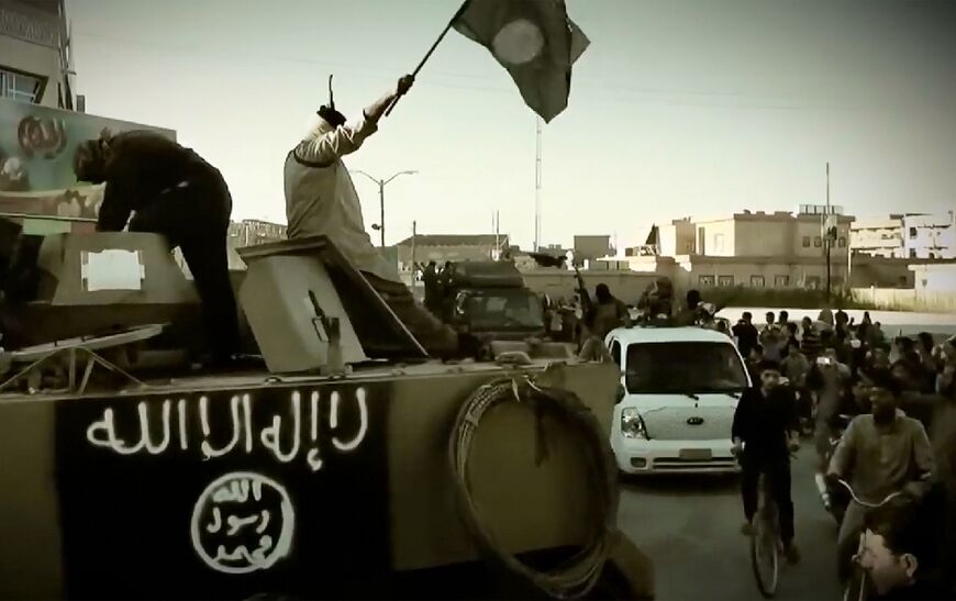 A propaganda video released on March 17, 2014 by the group then called the Islamic State of Iraq and the Levant (ISIL) showing fighters on an armoured vehicle 