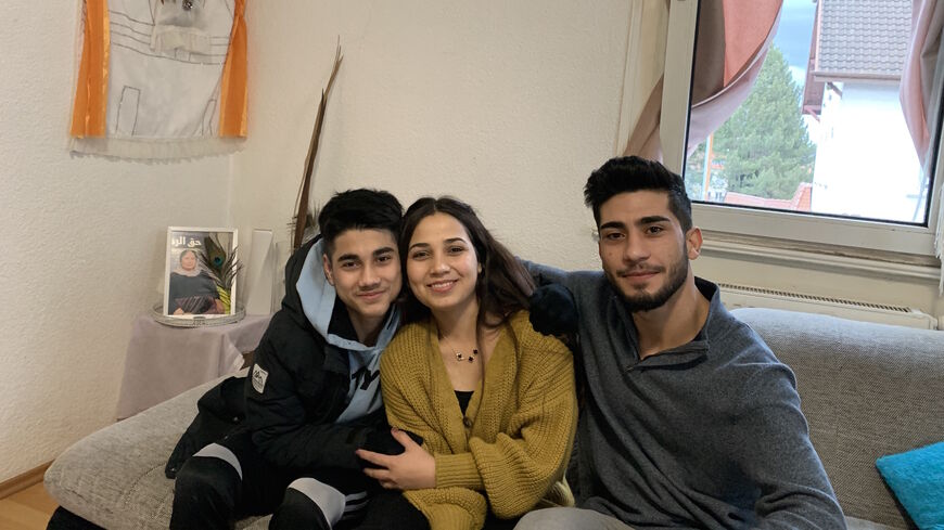 Sipan Murad with her brothers Nechirvan (L) and Majdal (R), in Rottweil, Germany, Feb. 18, 2022. (Amberin Zaman/Al-Monitor)