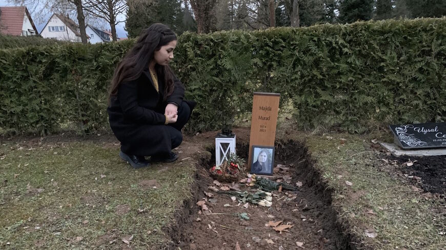 Sipan Murad visits her mother's grave in Rottweil, Germany, Feb. 18, 2022. Amberin Zaman 