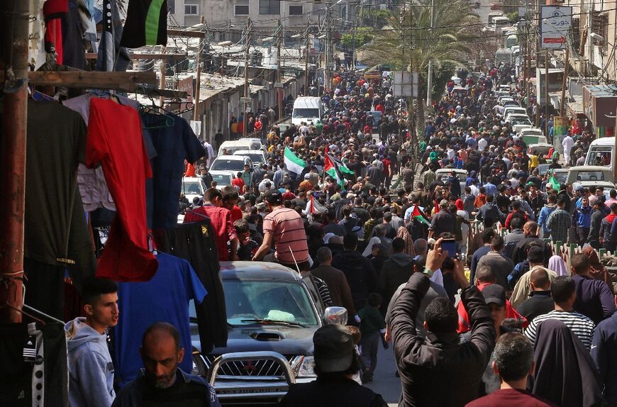 Supporters of the Palestinian Hamas and Islamic Jihad movements rally after Friday prayers in Gaza City on April 