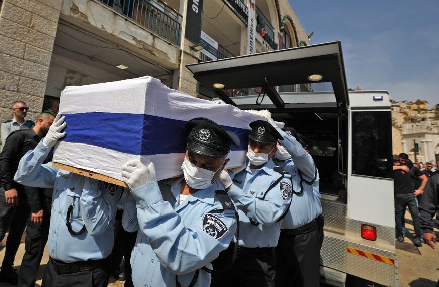 Israeli mourners attend the funeral of Amir Khoury, 32, an Arab Israeli Christian policeman, one of the five people killed in a shooting attack in the religious town of Bnei Brak, on March 31, 2022 in Nazareth