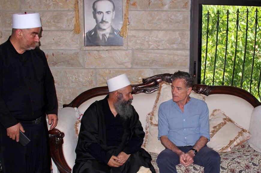 Independent candidate Elias Jradi, seen here being congratulated by Druze clerics, took a seat that Hezbollah and its allies had not lost in three decades