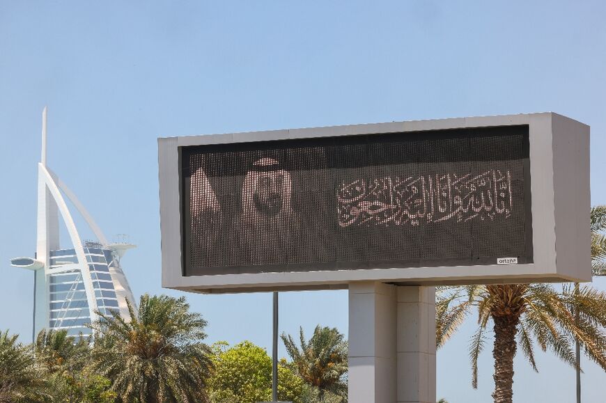 A billboard displays a portrait of the UAE's late president Sheikh Khalifa bin Zayed Al Nahyan in the Emirate of Dubai